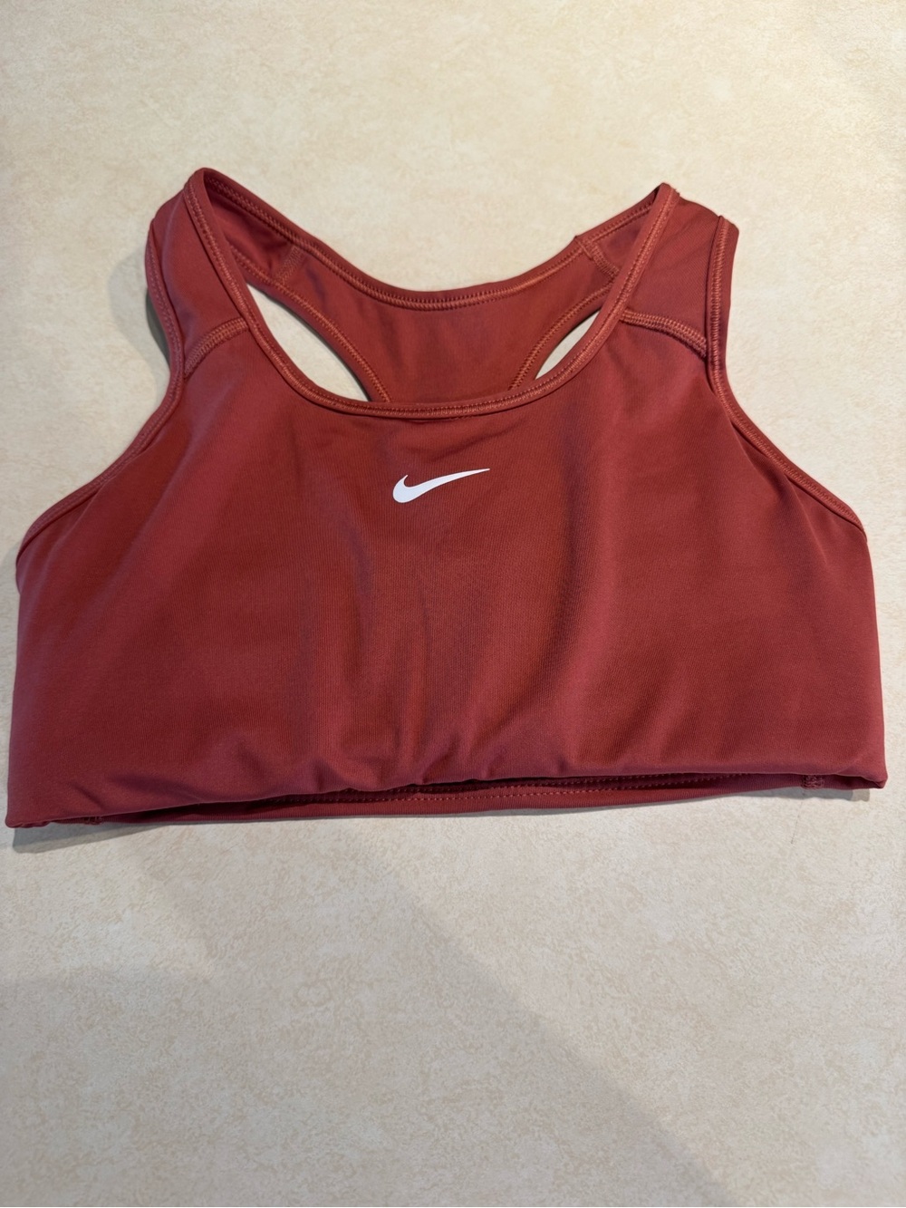 Nike Rust Red Racerback Sports Bra with White Swoosh
